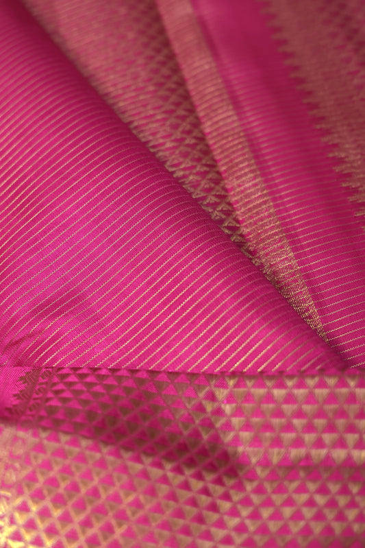 Kanchipuram Silk Saree in Magenta with Gold Zari Stripes