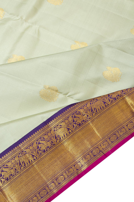 Pista Green Kanchipuram Silk Saree with Kuttu Border and Leaf Butta