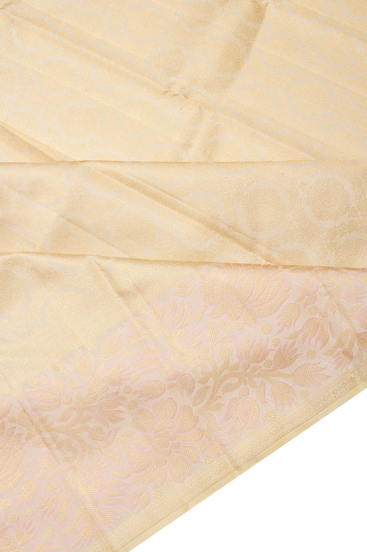 Cream Kanchipuram Silk Saree with Floral Butta Pallu