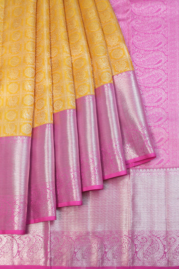 Mustard Kanchipuram Silk Saree with Pink Border in Silver Zari