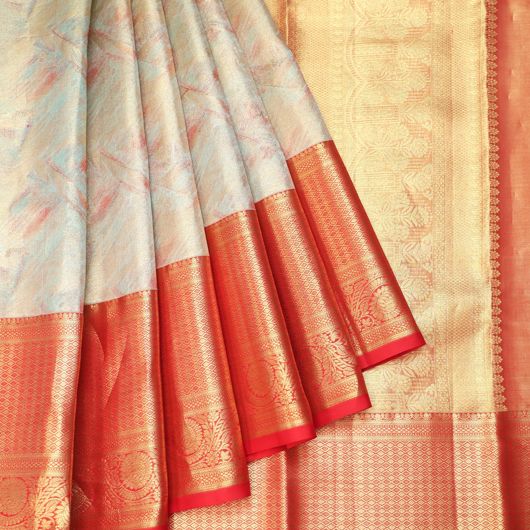 Sea Green Kanchipuram Tissue Silk Saree with Abstract Design