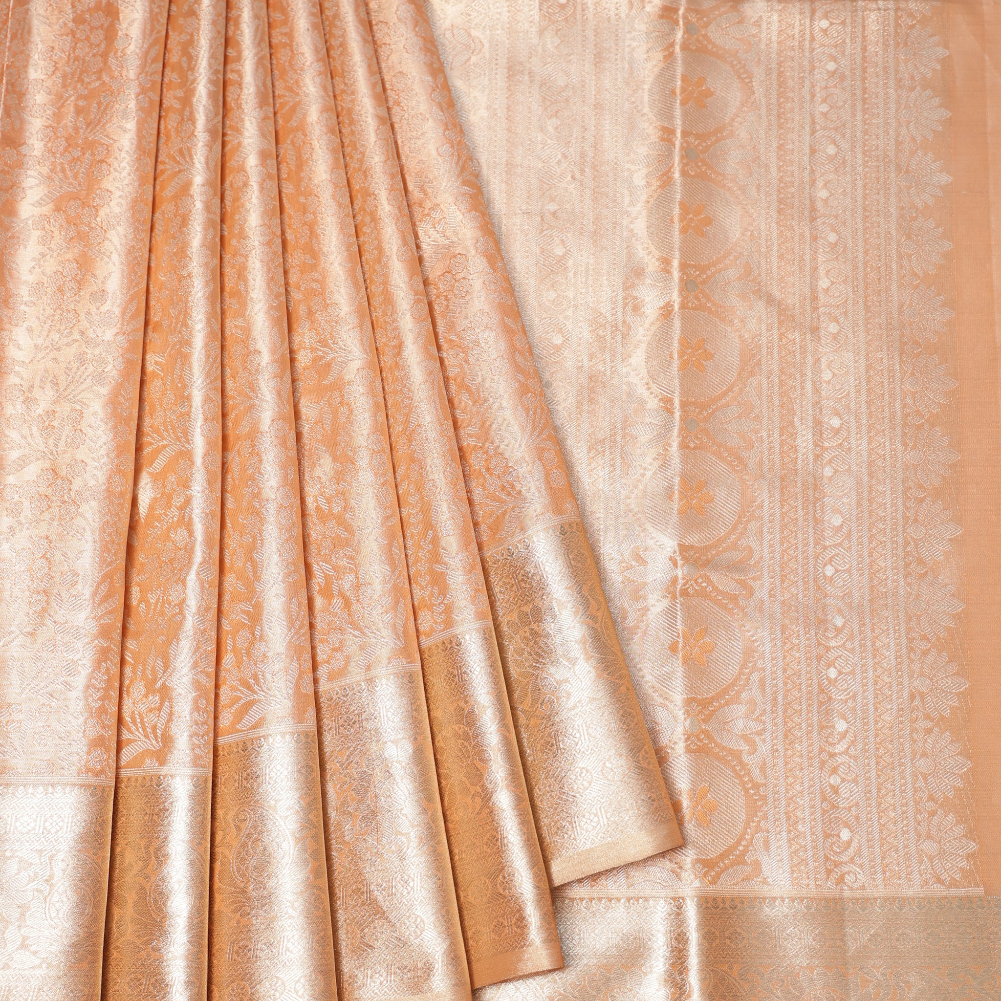 Peach Kanchipuram Silk Saree with Foral and Paisley Motifs
