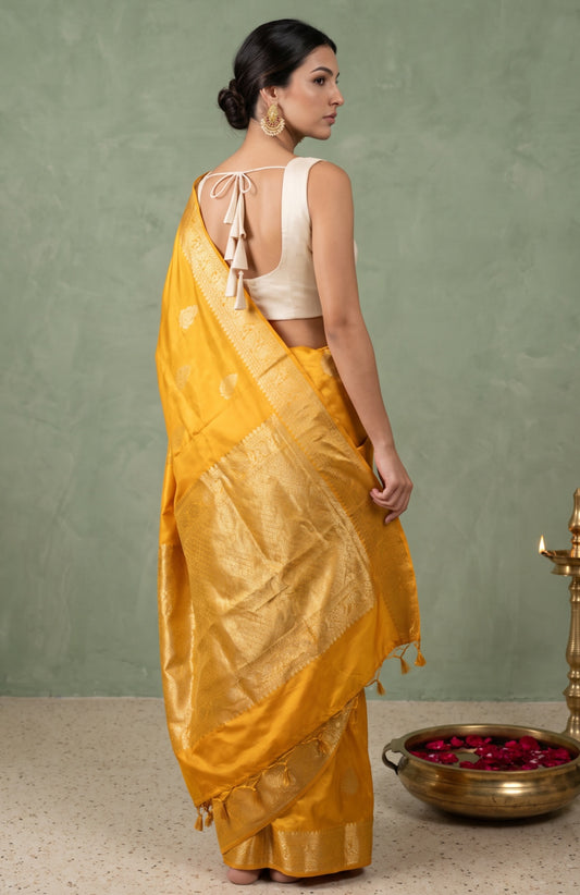 Yellow Muslin Silk Saree with Floral Zari Border