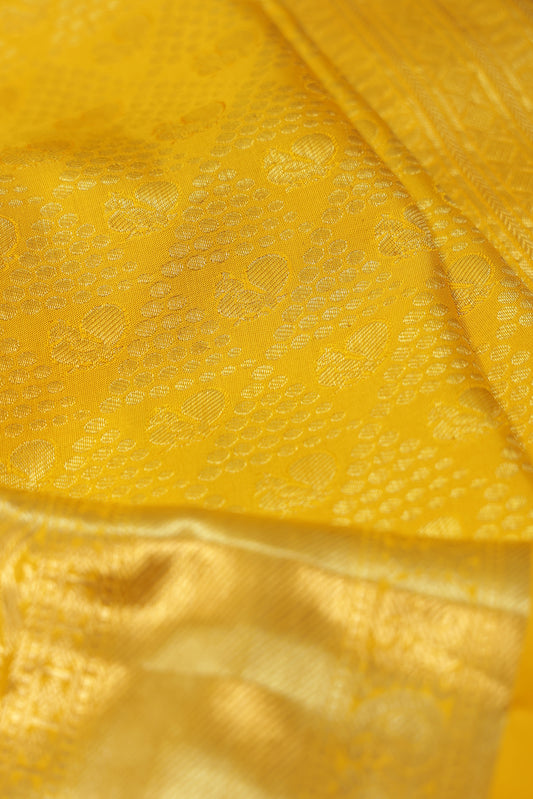 Yellow Kanchipuram Silk Saree with Silver Zari Mayil Motifs