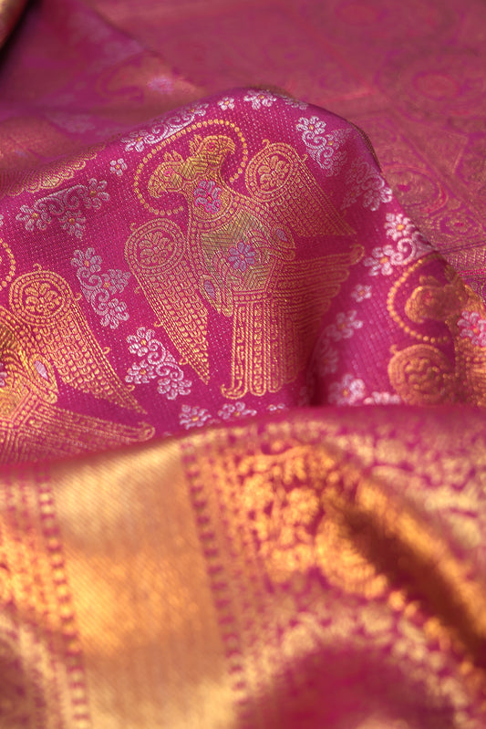 Magenta Kanchipuram Silk Saree with Iruthalai Pakshi Motifs