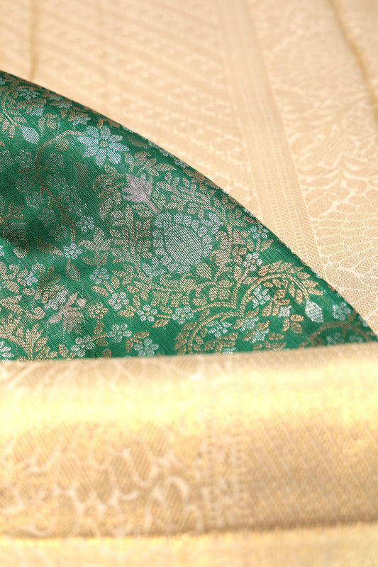 Green Kanchipuram Silk Saree with Cream Zari Border