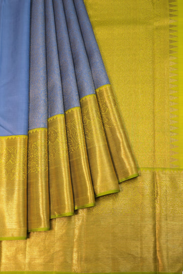 Indigo Blue Kanchipuram Silk Saree with Parrot Green & Gold Zari Border