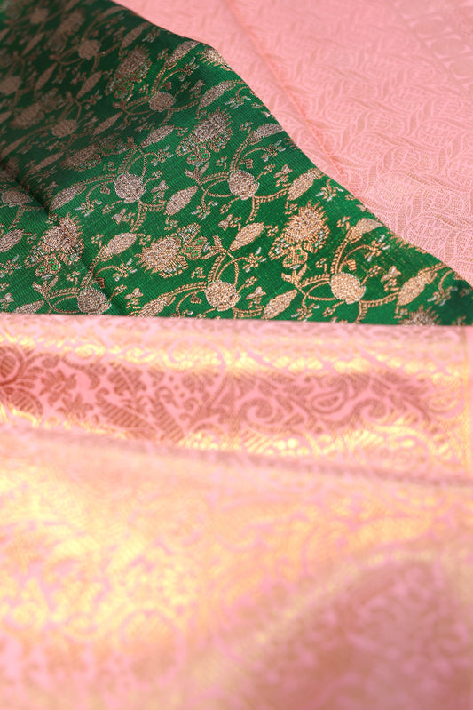 Green Kanchipuram Silk Saree with Floral Pink Zari Border