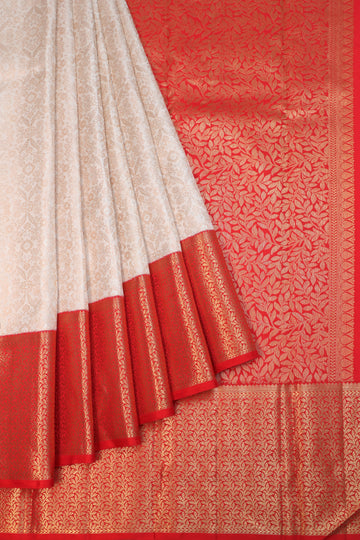 Cream Kanchipuram Silk Saree with Red Jaal Pallu