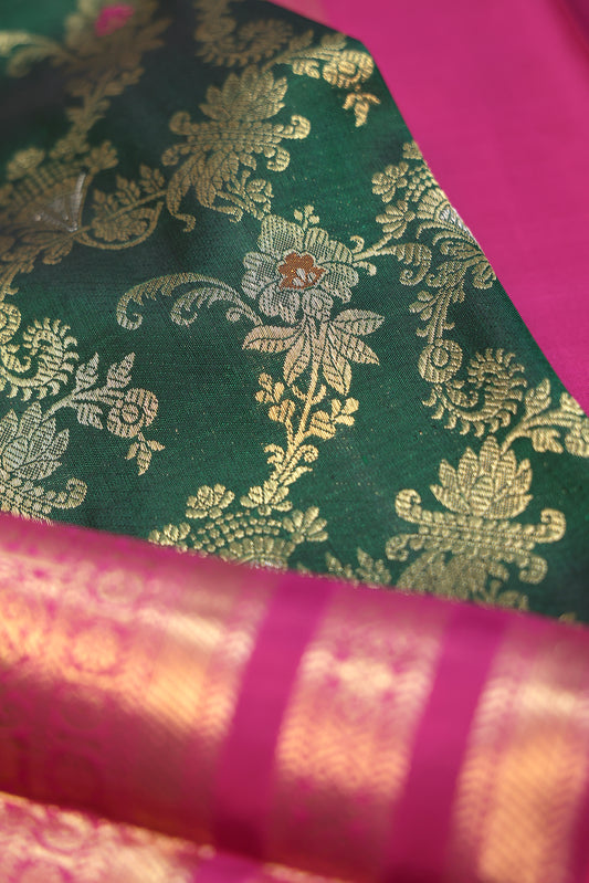 Green Kanchipuram Silk Saree with Yanai & Mayil Motif Border