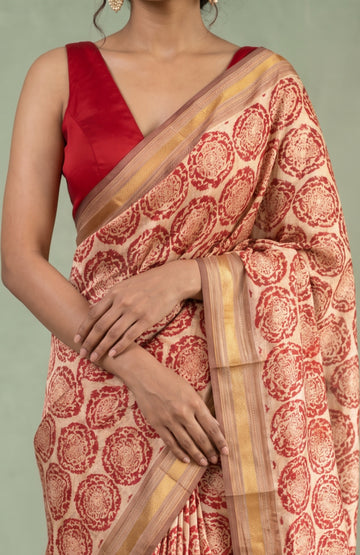 Cream Patan Patola Silk Saree with Kaddi Border