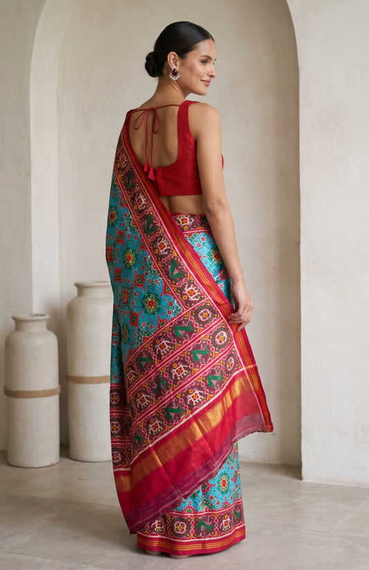 Blue Patan Patola Silk Saree with Pink Floral Border