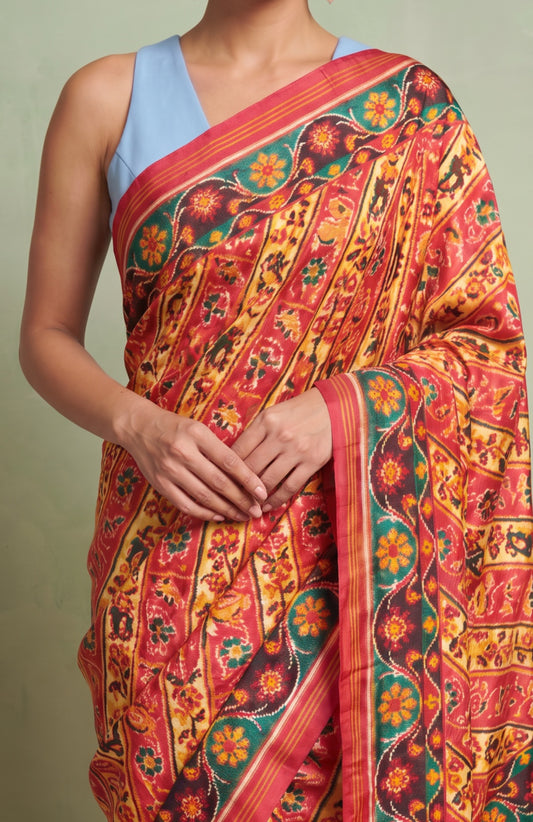 Pink Patan Patola Silk Saree with Blue Contrast Border