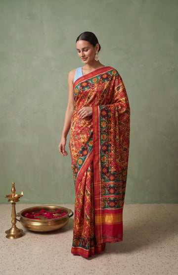 Pink Patan Patola Silk Saree with Blue Contrast Border