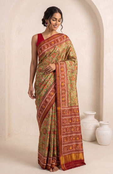 Pista Green Patan Patola Silk Saree with Elegant Brown Contrast Jaal