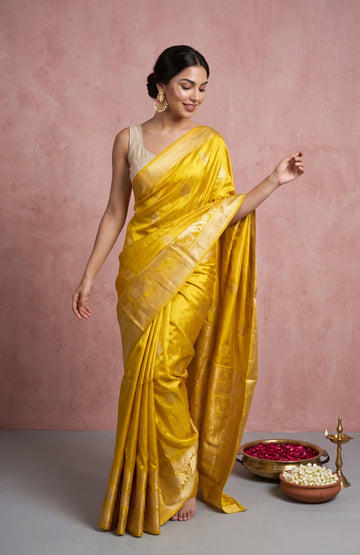 Mehendi Green Mashru Silk Saree with Gold & Silver Zari Cow Motifs