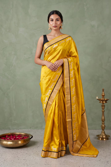 Neon Yellow Mashru Silk Saree  with Gold & Silver Zari Deer Motifs