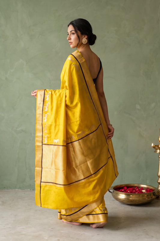 Neon Yellow Mashru Silk Saree  with Gold & Silver Zari Deer Motifs