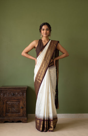 Off-White Pochampally Ikat Silk Saree with Peacock Motifs