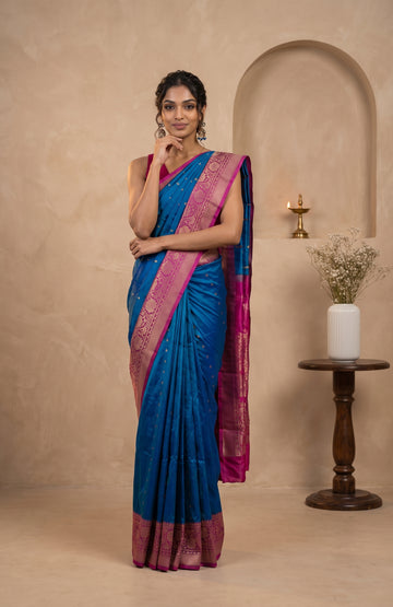 Peacock Blue Banaras Katan Silk Saree with Pink Floral Pallu