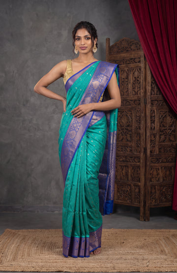 Green Banaras Katan Silk Saree with Blue Tree Motifs