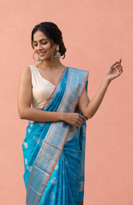 Sky Blue Soft Silk Saree with Mayil & Tree Motifs