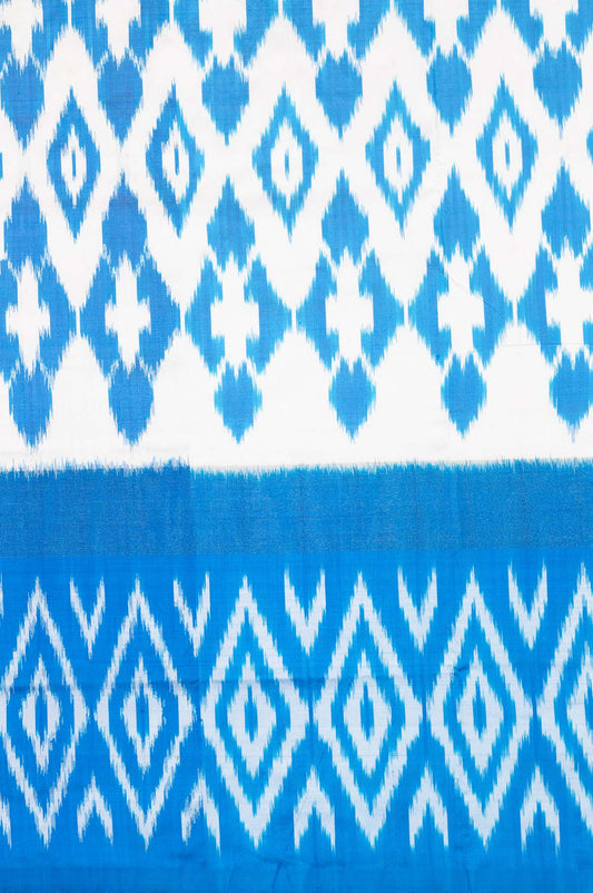 White and Ananda Blue Ikat Silk Saree