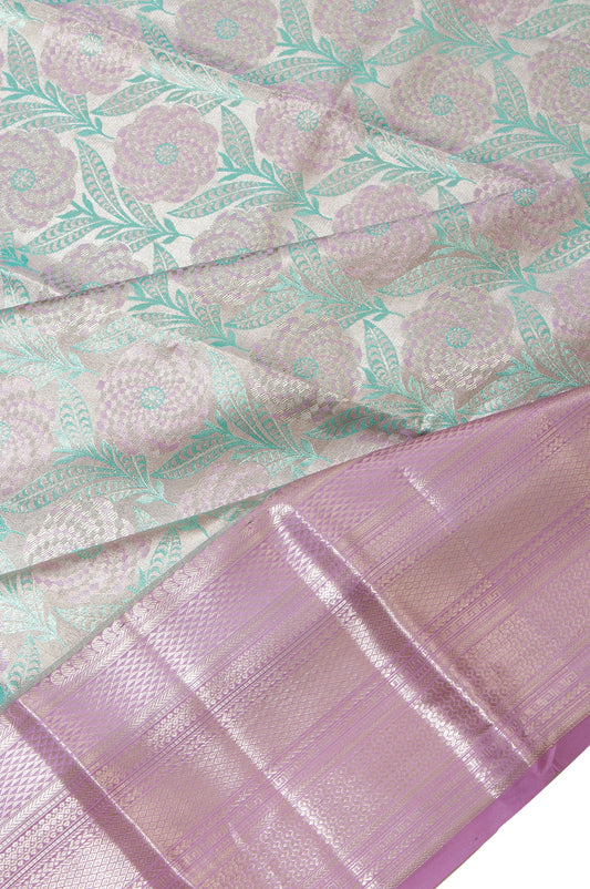 Green Kanchipuram Tissue Silk Saree with Nature-Inspired Motifs