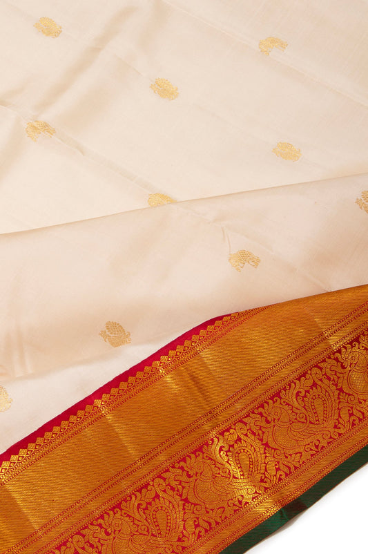 Cream Kanchipuram Silk Saree with Kuttu Border and Floral Design