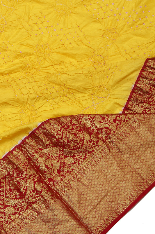 Yellow Bandhani Kanchi Silk Saree with Peacock Motif Border