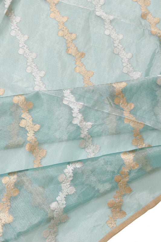 Sea Blue Organza Silk Saree with Gold Zari Floral Brocades and Polka Dot Buttas