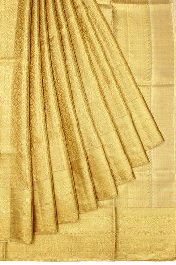 Gold Kanchipuram Tissue Silk Saree with Chevron Patterns and Flower Jaal