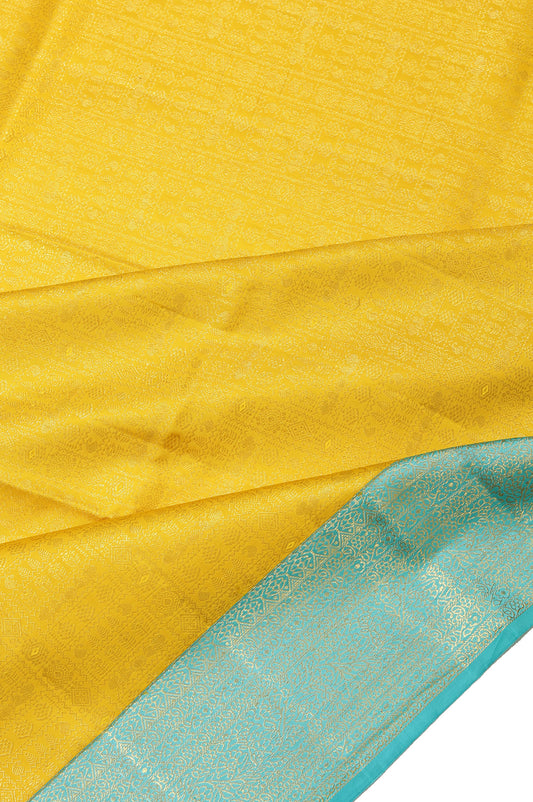 Yellow Kanchipuram Silk Saree with Sea Green Border