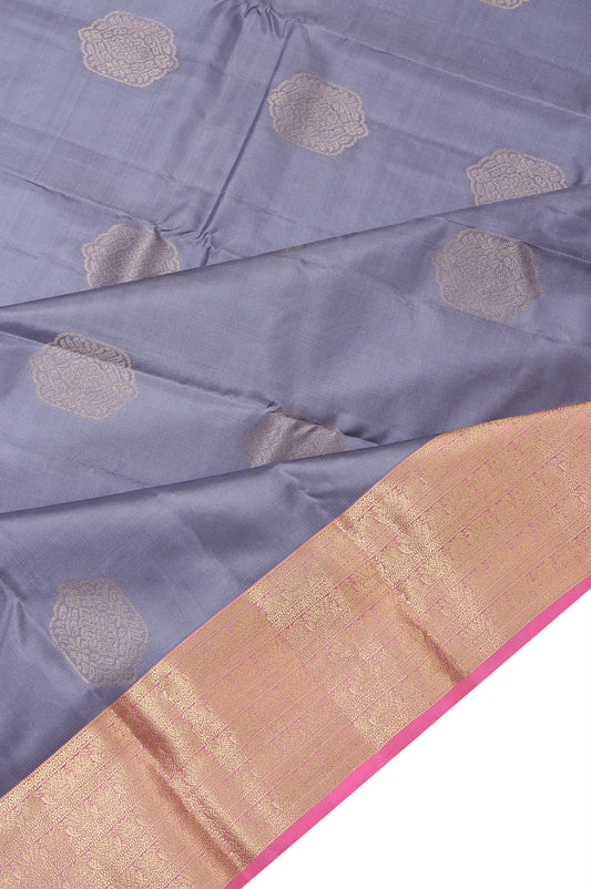 Grey Soft Silk Saree with Peach Border and Gold Zari Flower Design