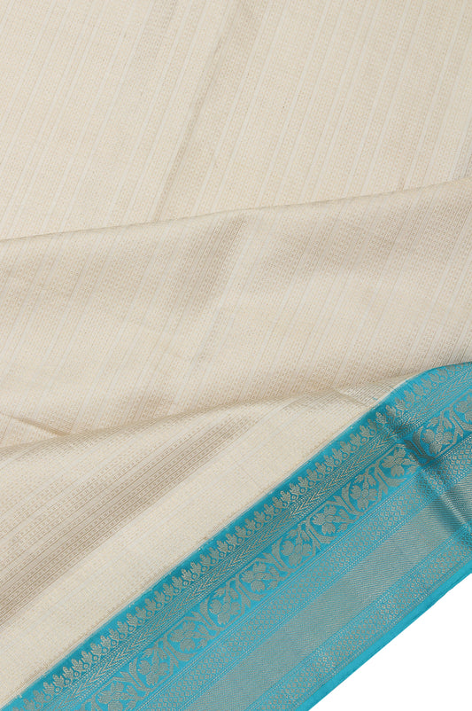 Off White Soft Silk Saree with Sky Blue Border and Floral Designs