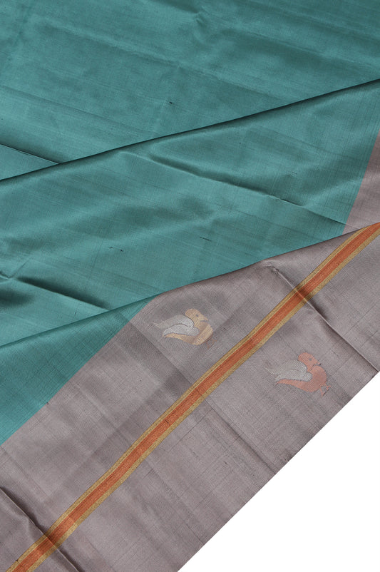 Green Soft Silk Saree with Plain Body Design