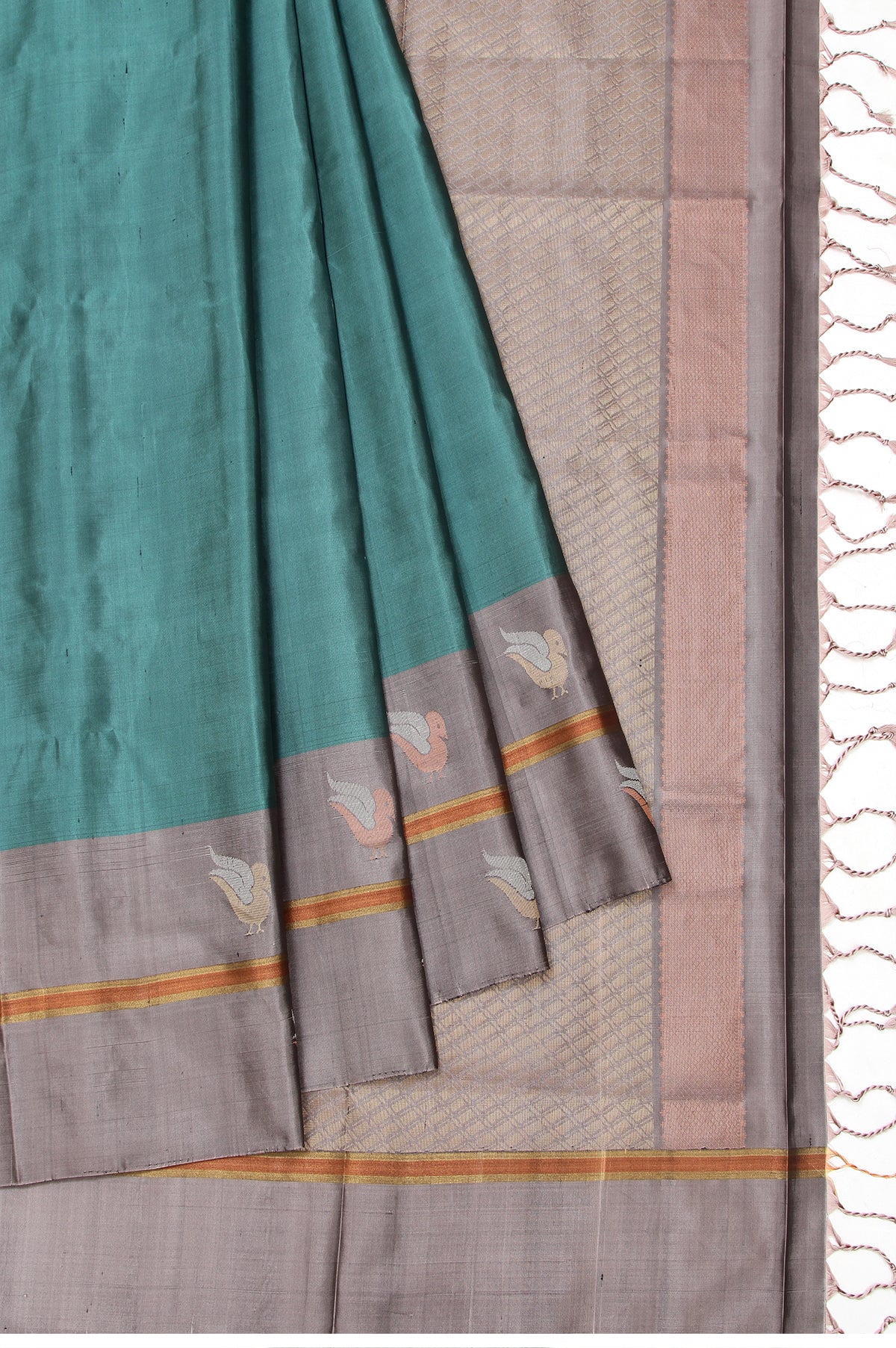 Green Soft Silk Saree with Plain Body Design