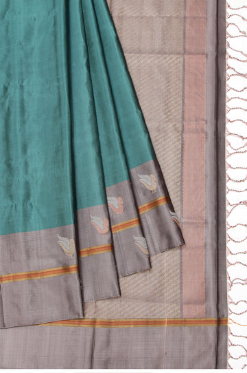 Green Soft Silk Saree with Plain Body Design