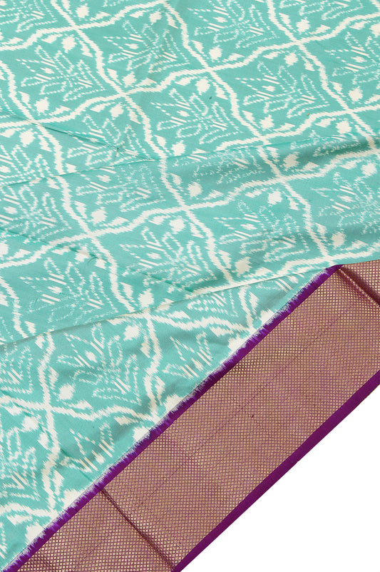 Sea Green Ikat Silk Saree with Floral Jaal and Motifs