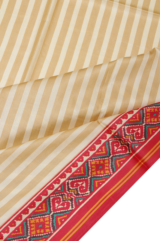 Cream Tussar Silk Saree with Red Patan Patola Border